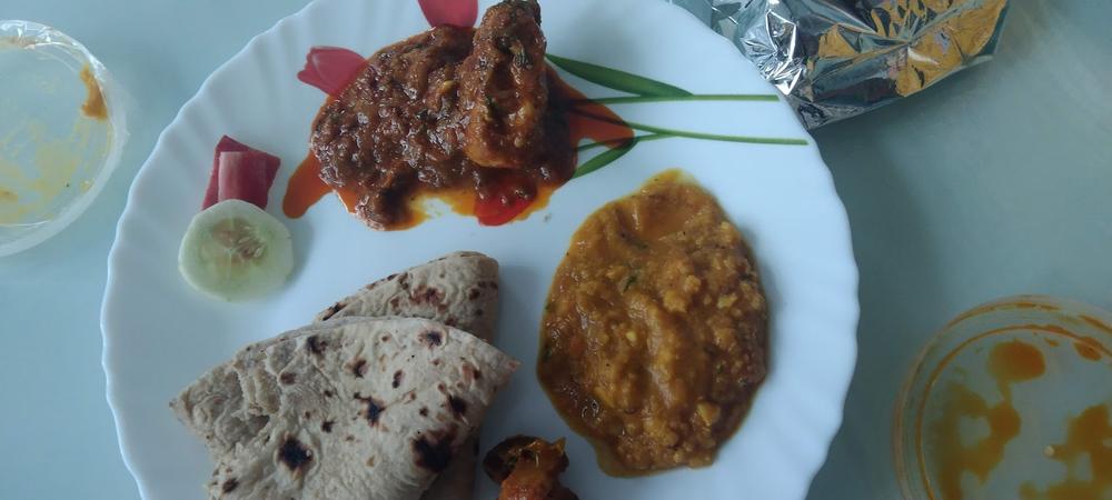 A full thali from Digitiffin with sabzi, dal, roti and salad